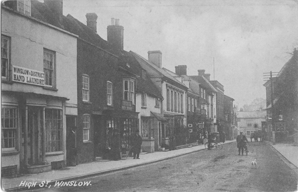 High Street looking south, Winslow Hand Laundry sign on first building